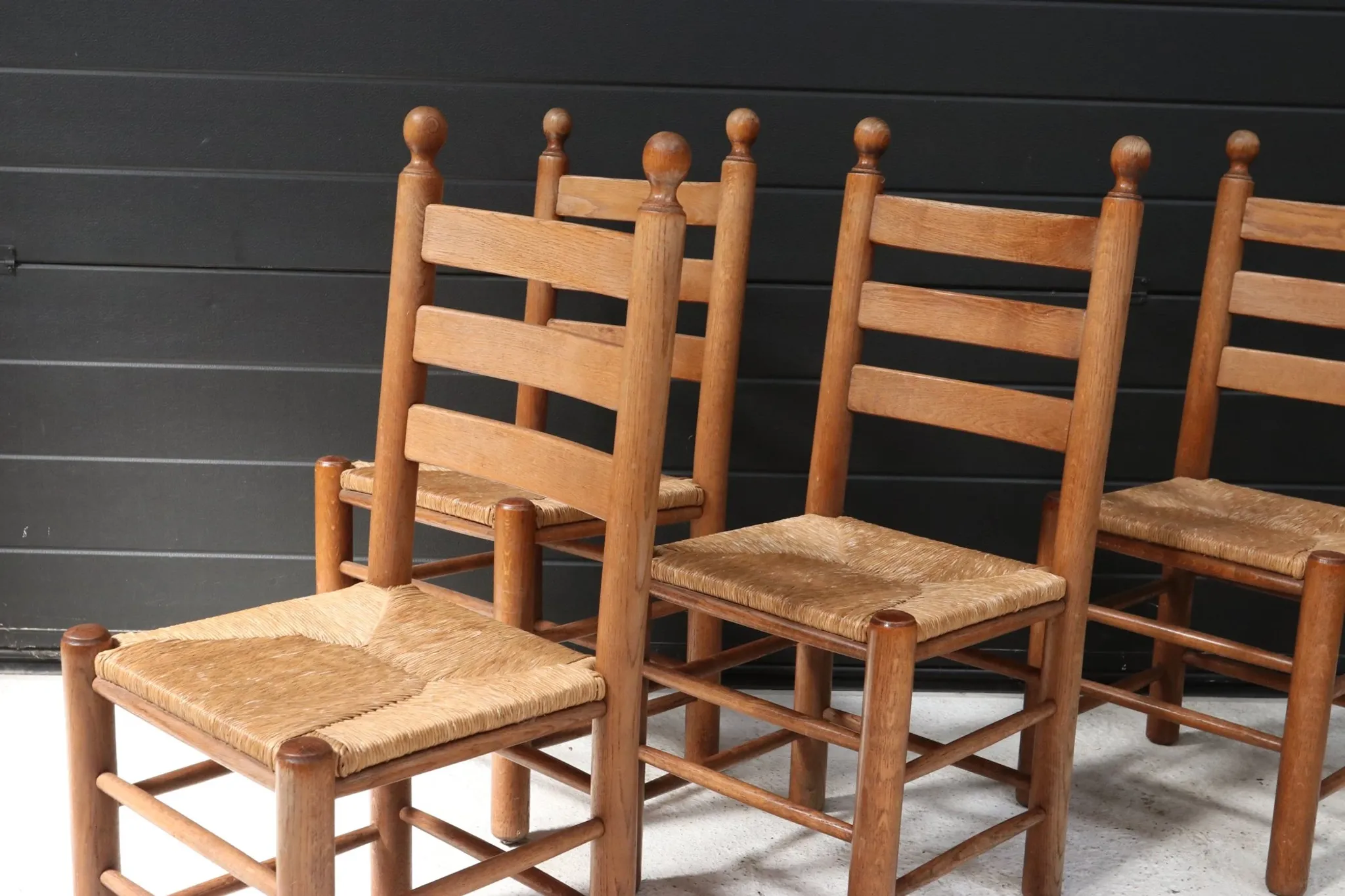 Set of four French ladderback chairs with rush seats – circa 1960
