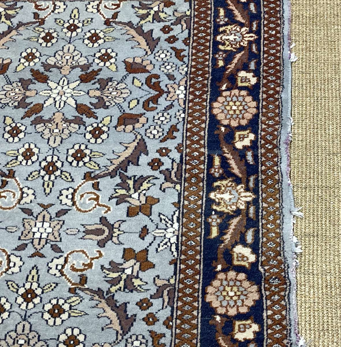 Handmade wool oriental carpet (wear defects)