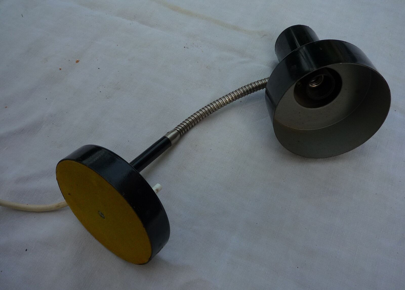 Small desk lamp articulated in black metal, vintage 1960