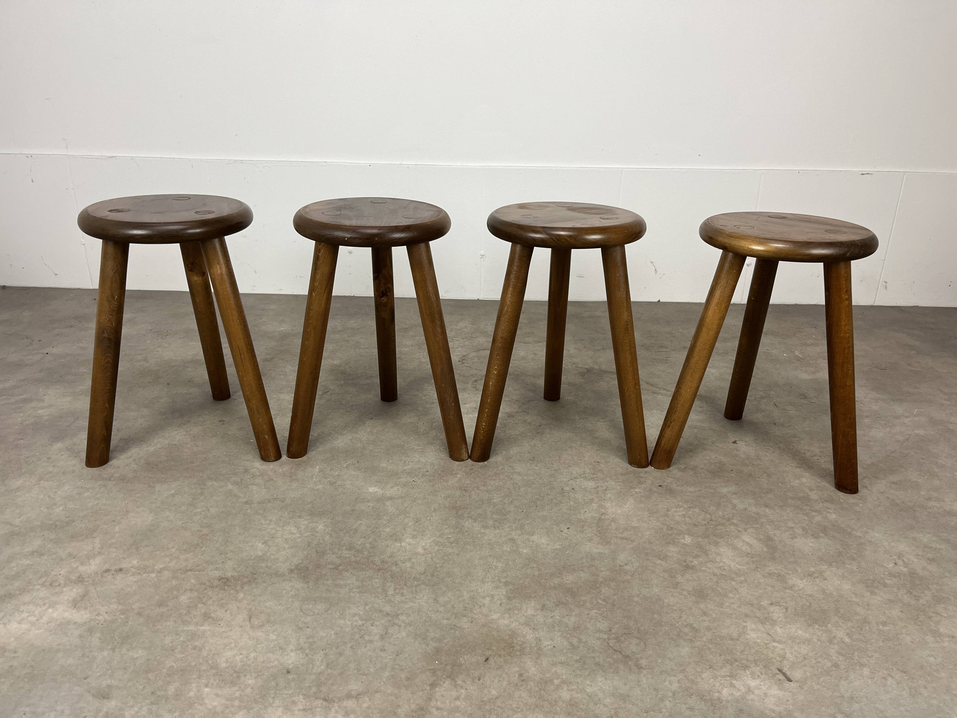 4 wooden tripod stools