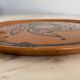 Round glazed earthenware dish by Biot, 20th century, stylized decoration
