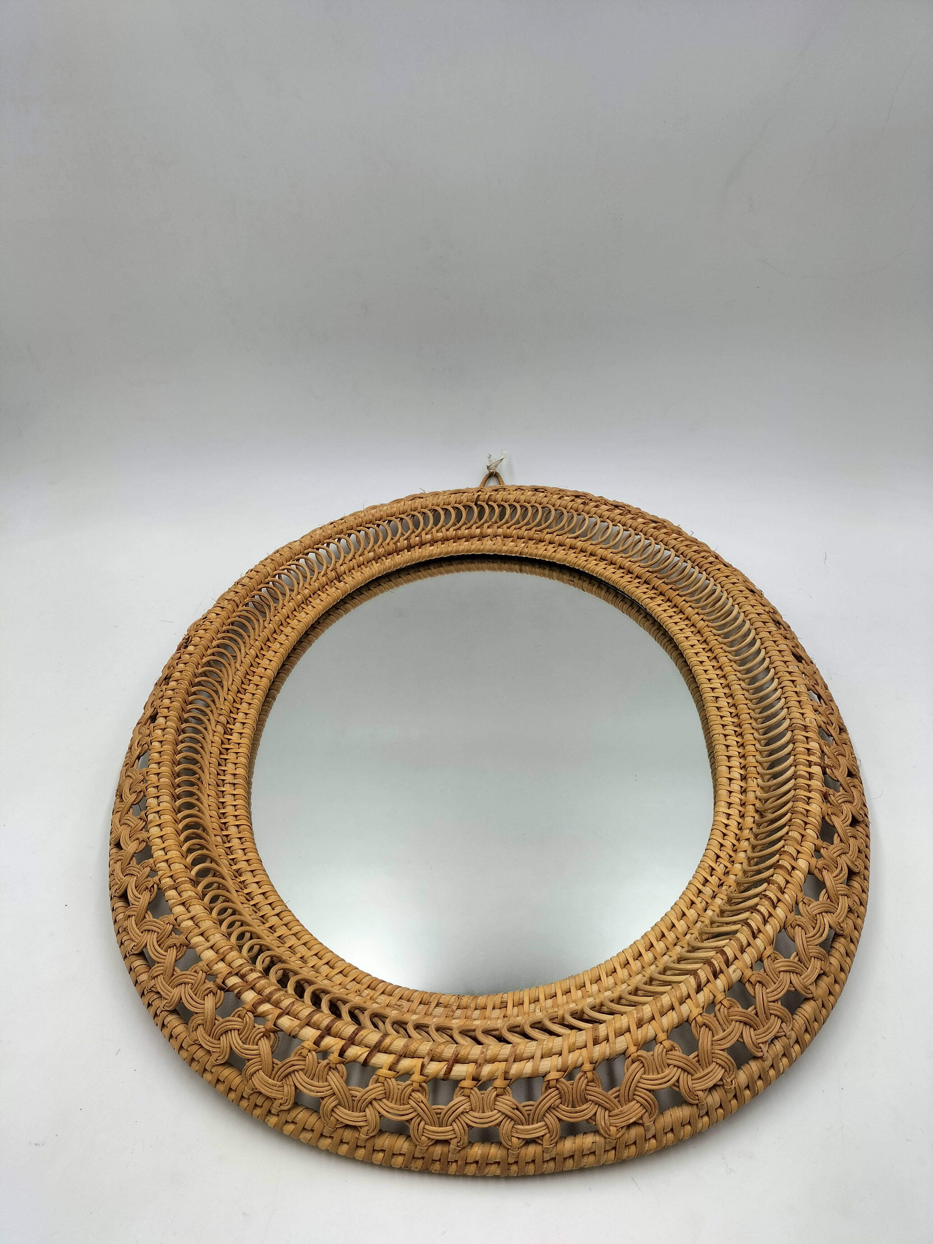 Oval rattan mirror