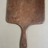 Old beveled hand mirror and wooden frame