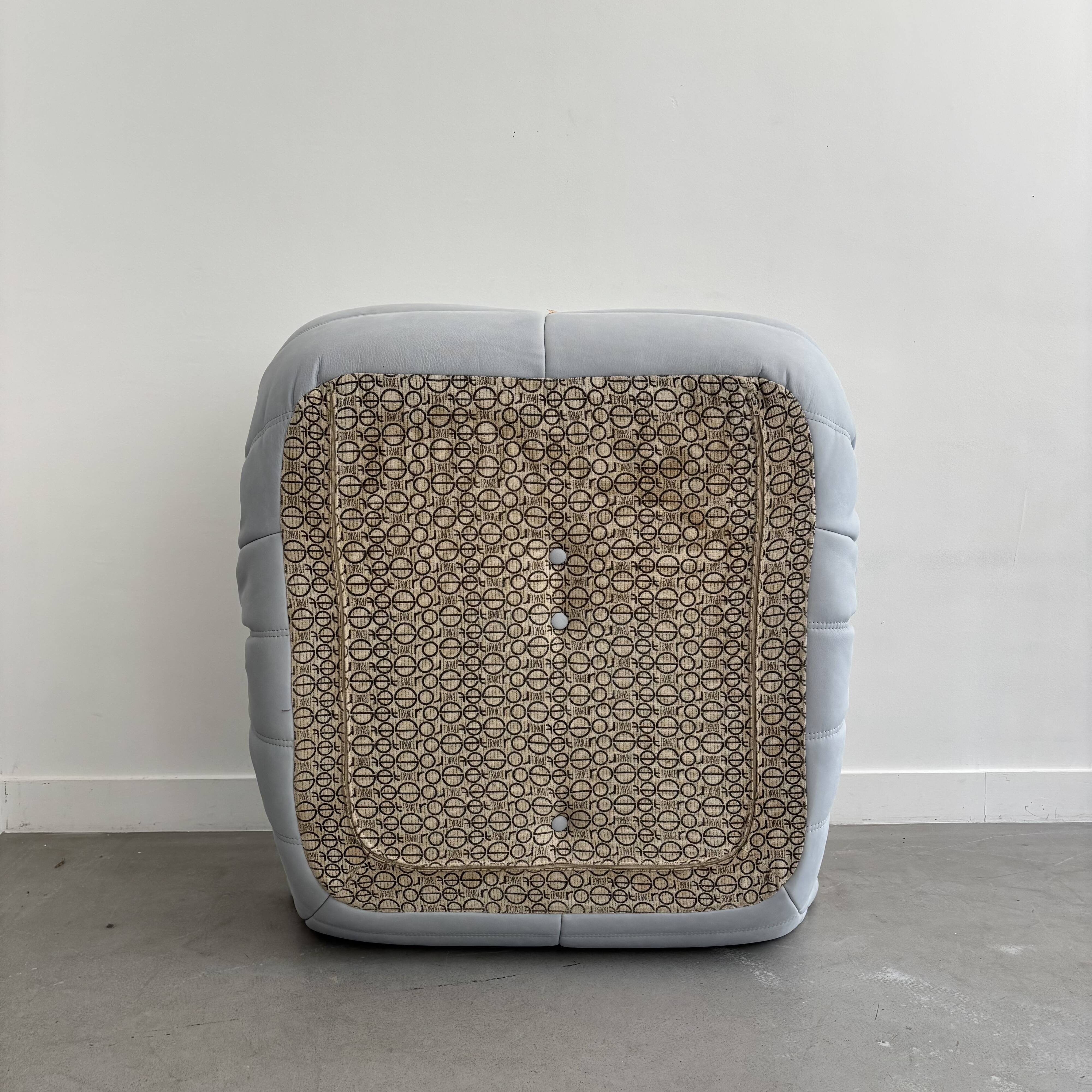 Sky blue leather armchair