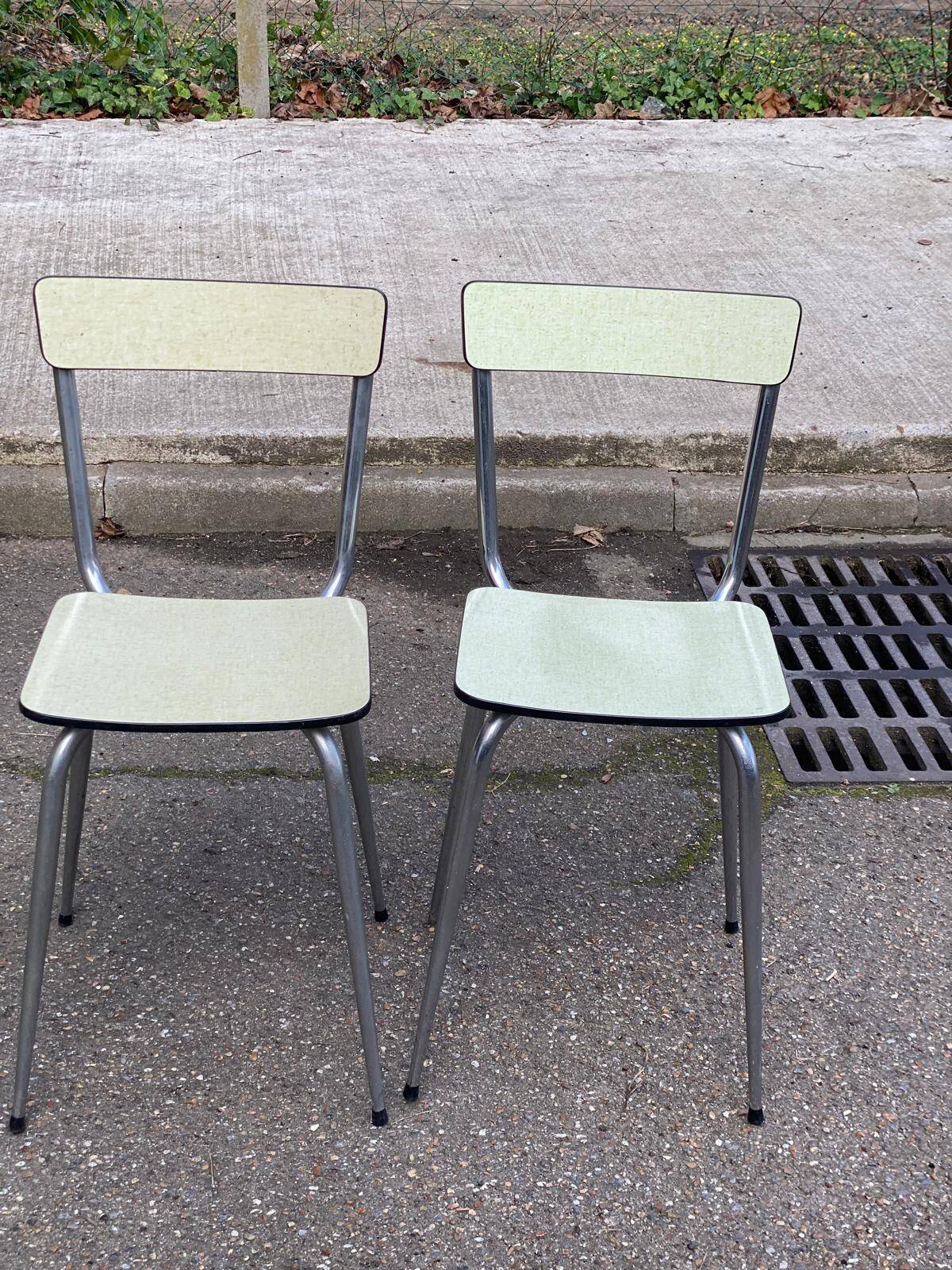 2 light green Formica and steel chairs from the 1980s.
