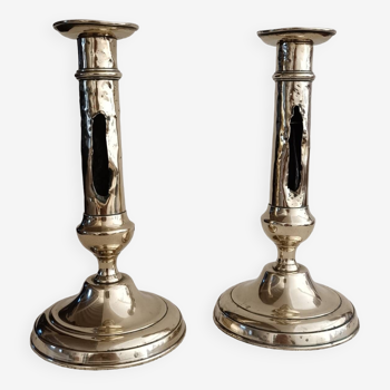 Pair of yellow copper candlesticks