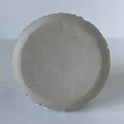 Meeting of three artist's ceramic objects including two pots and a cream covered bowl