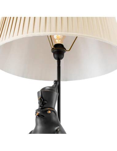 Pair of Horus model table lamps, patinated bronze.