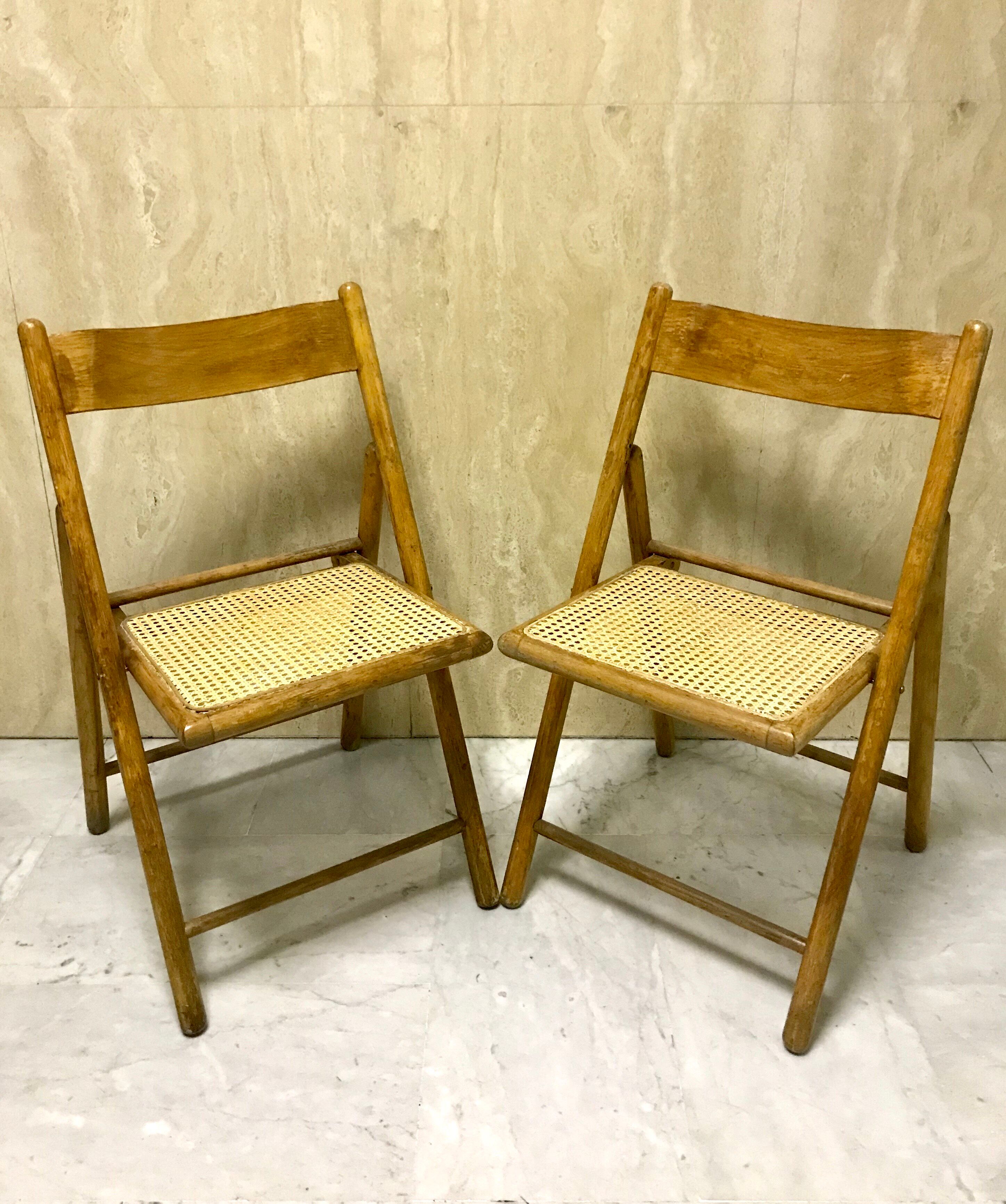 Duo of canned folding chairs