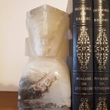 Onyx book clambands depicting an Aztec statue