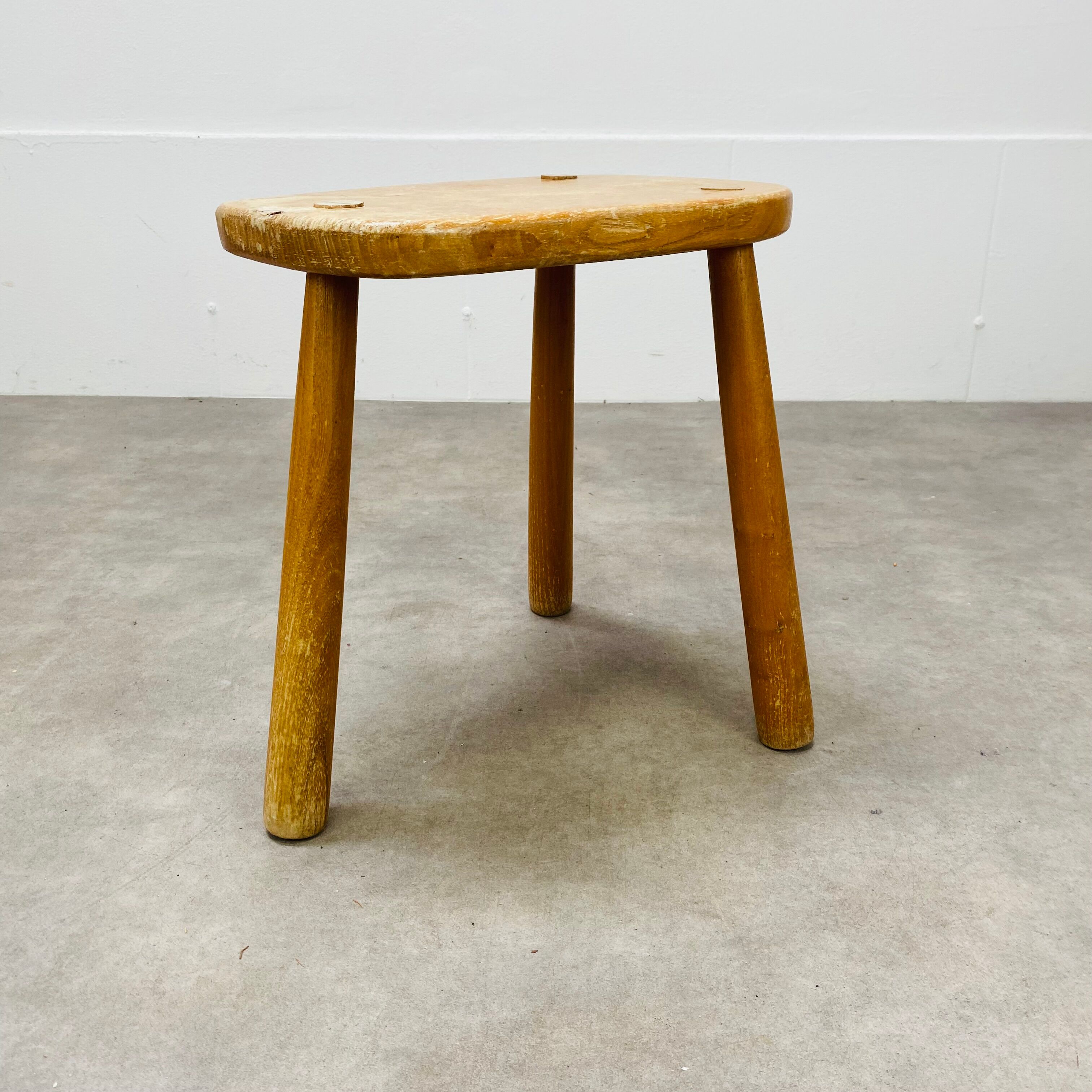 Brutalist solid wood tripod stool