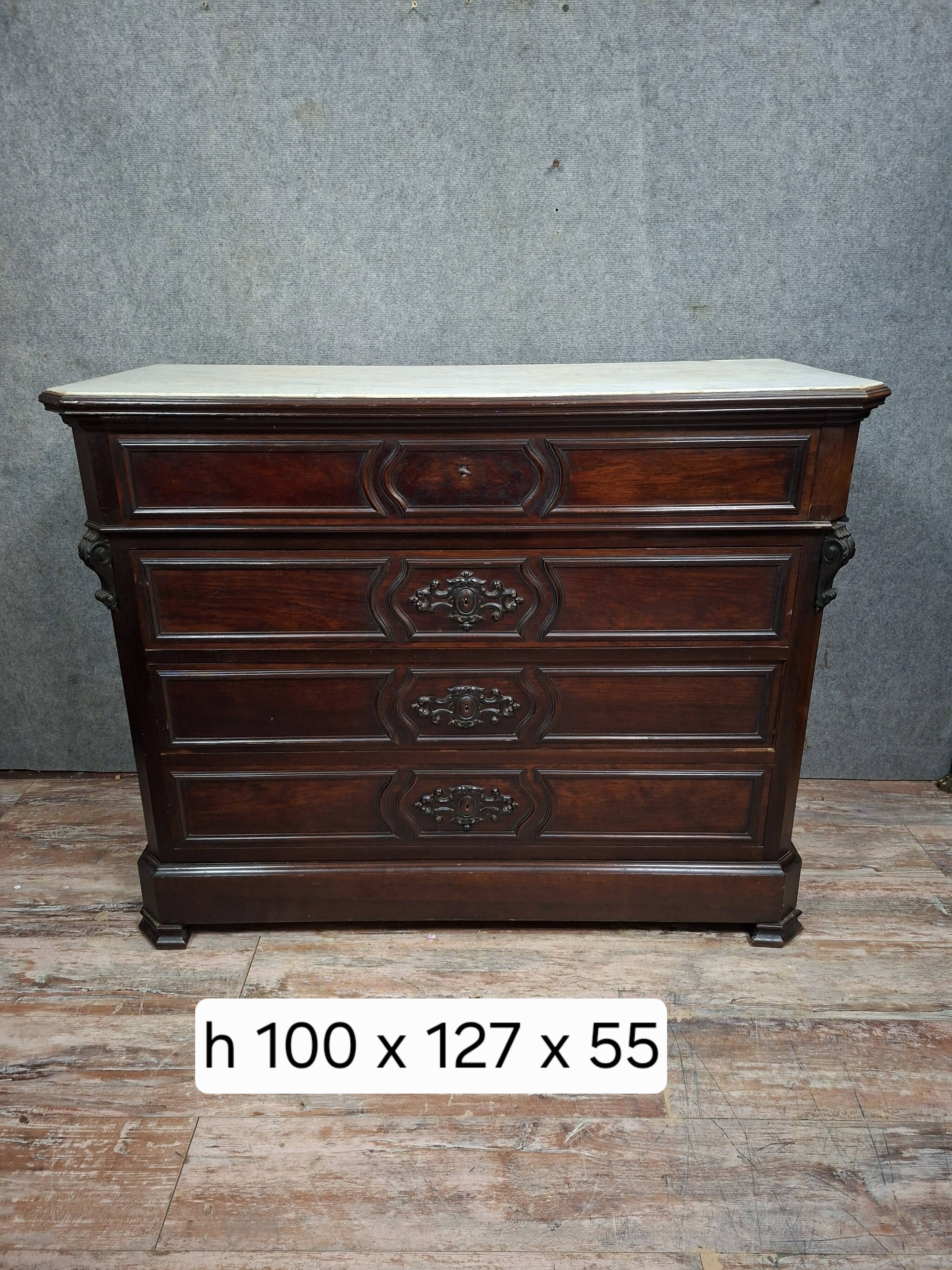 Napoleon III period secretary chest of drawers in mahogany and light wood.
