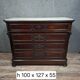 Napoleon III period secretary chest of drawers in mahogany and light wood.