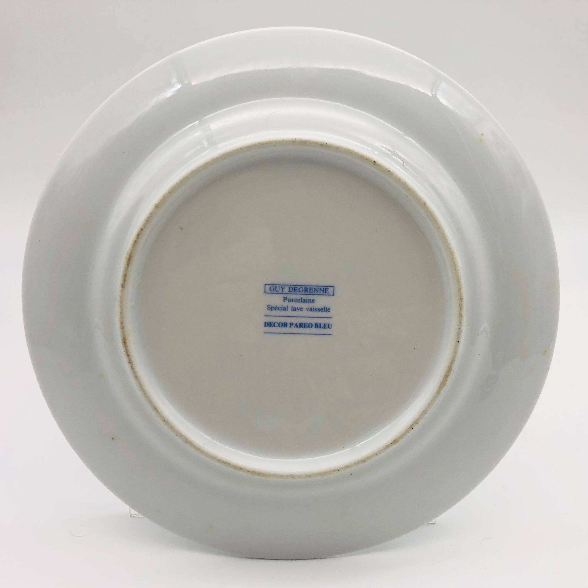 6 Guy Degrenne porcelain plates.