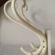 Wall-mounted parrot coat rack