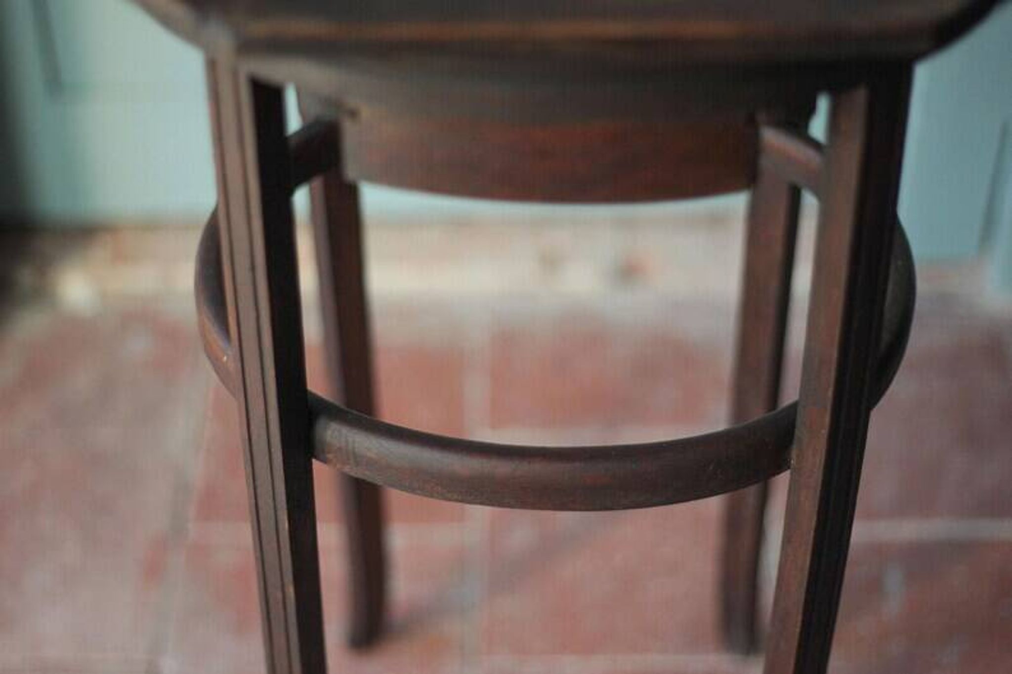 Wooden drawer table or 19th-century work table with a curved wooden stretcher, in the style of Thonet, circa 1900-1920.