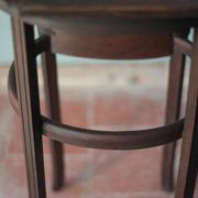 Wooden drawer table or 19th-century work table with a curved wooden stretcher, in the style of Thonet, circa 1900-1920.