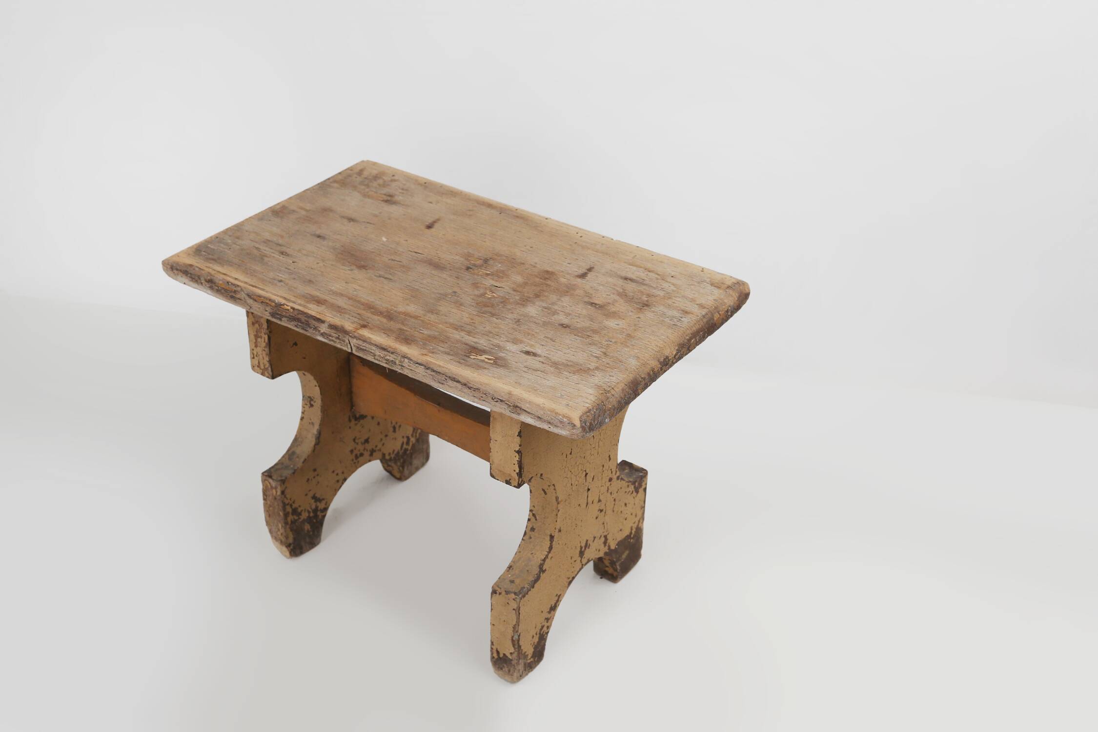 Beautiful shaped rustig low stool in painted wood, France ca. 1900