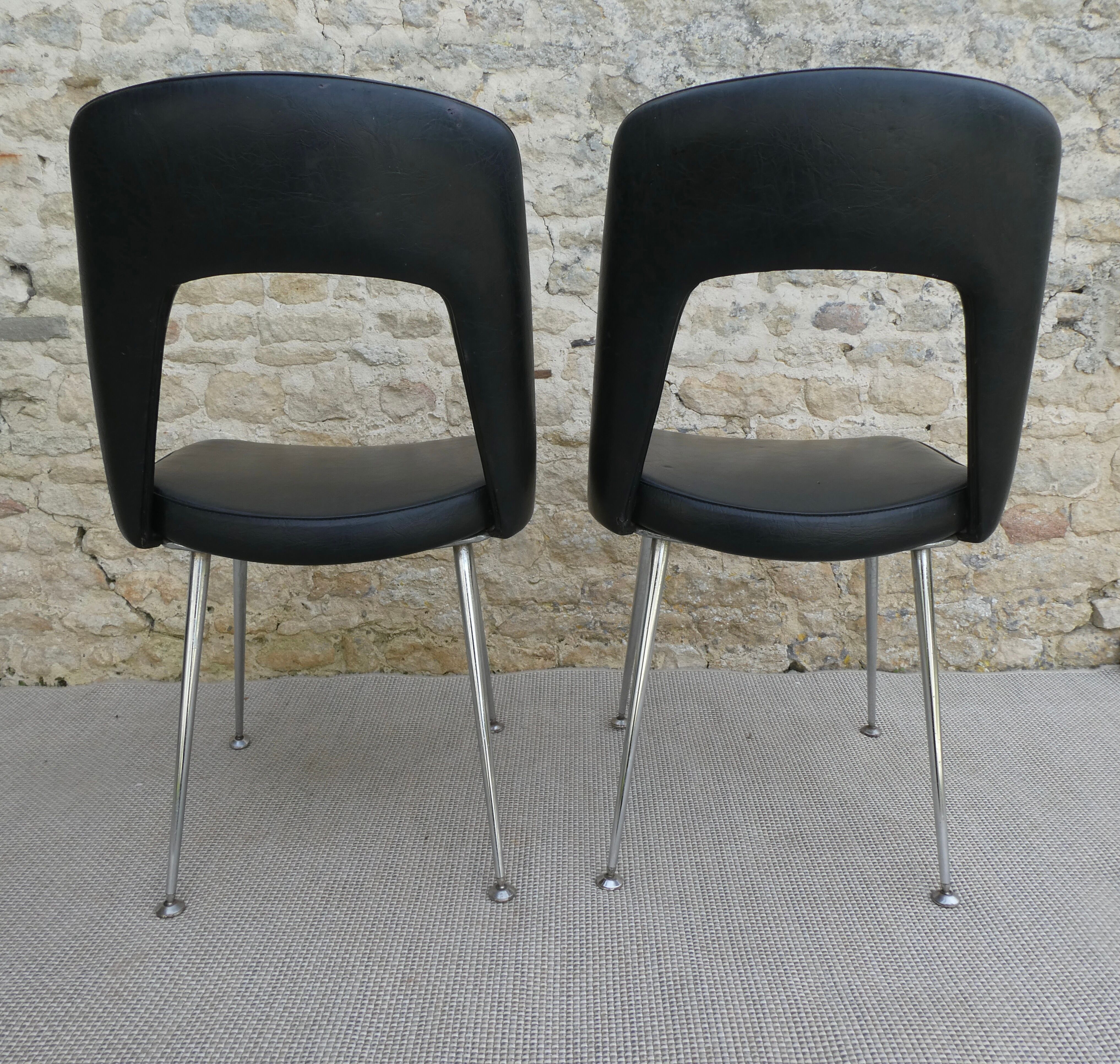 Pair of office chairs in chromed metal and skaï, 60s