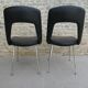 Pair of office chairs in chromed metal and skaï, 60s