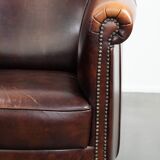 Characterful and comfortable cowhide leather armchair