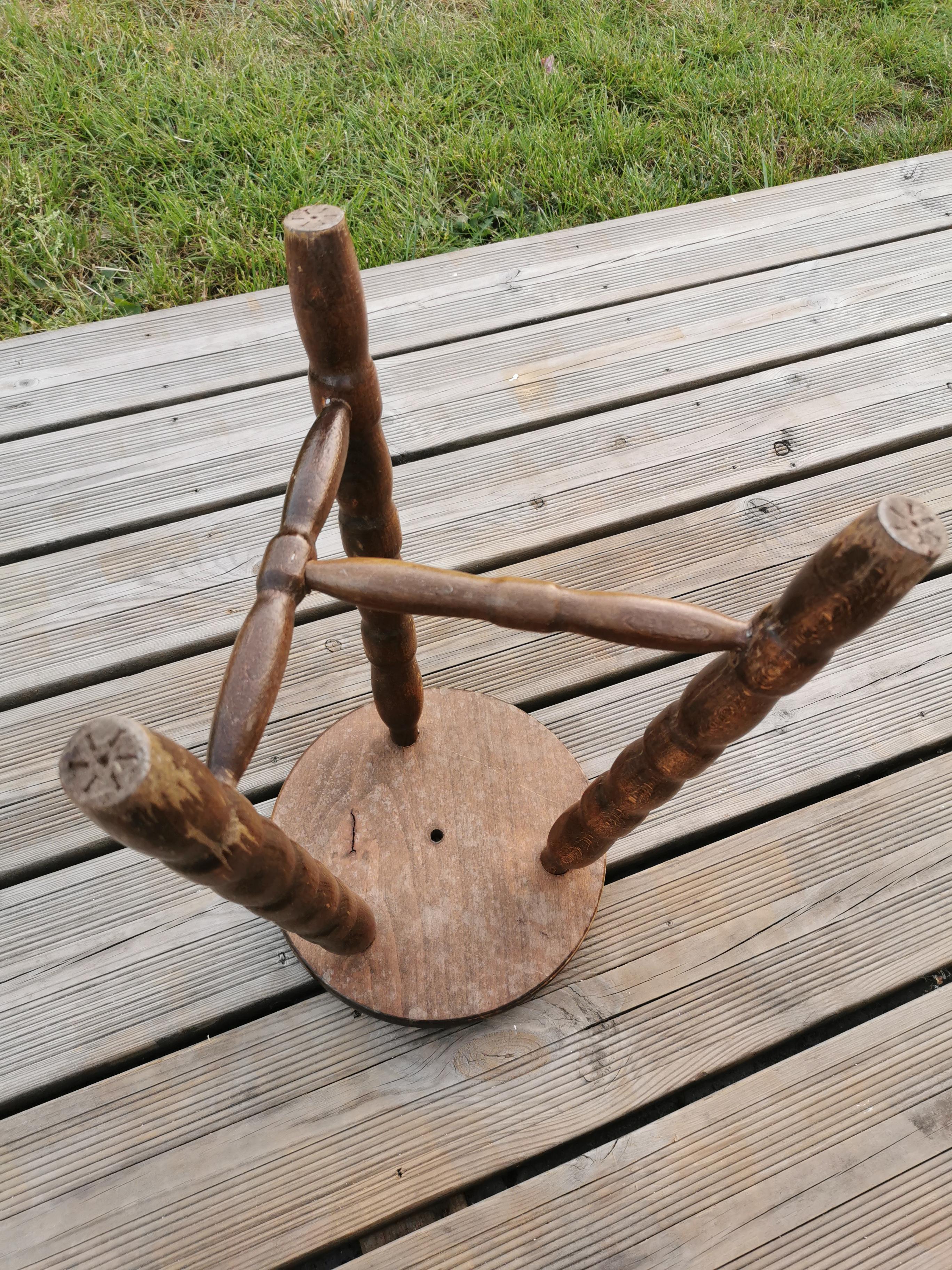 Wooden milking stool