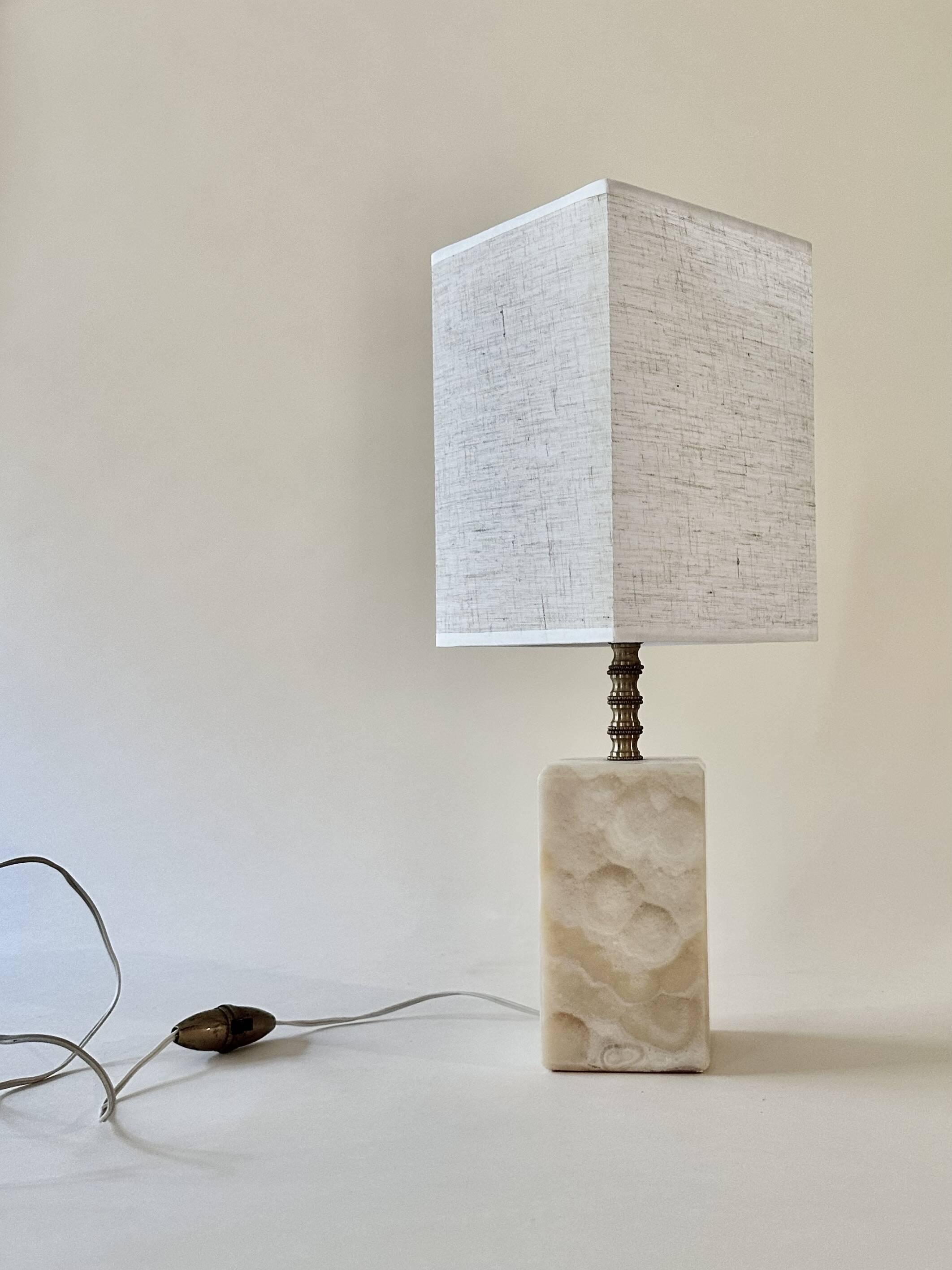 Onyx and brass lamp with a square shade.