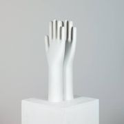 Pair of authentic vintage jewellery displays in industrial porcelain representing hands.