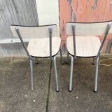 2 White Formica chairs