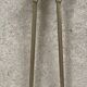 Brass fireplace tools in the style of Maison Baguès.