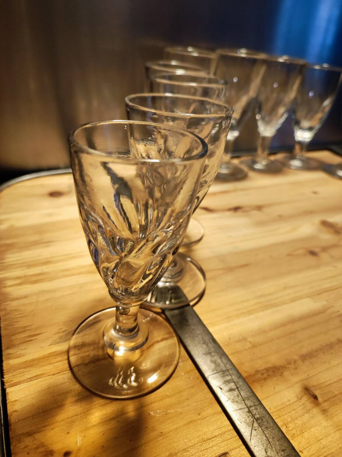 12 small twisted bistro glasses, 19th century