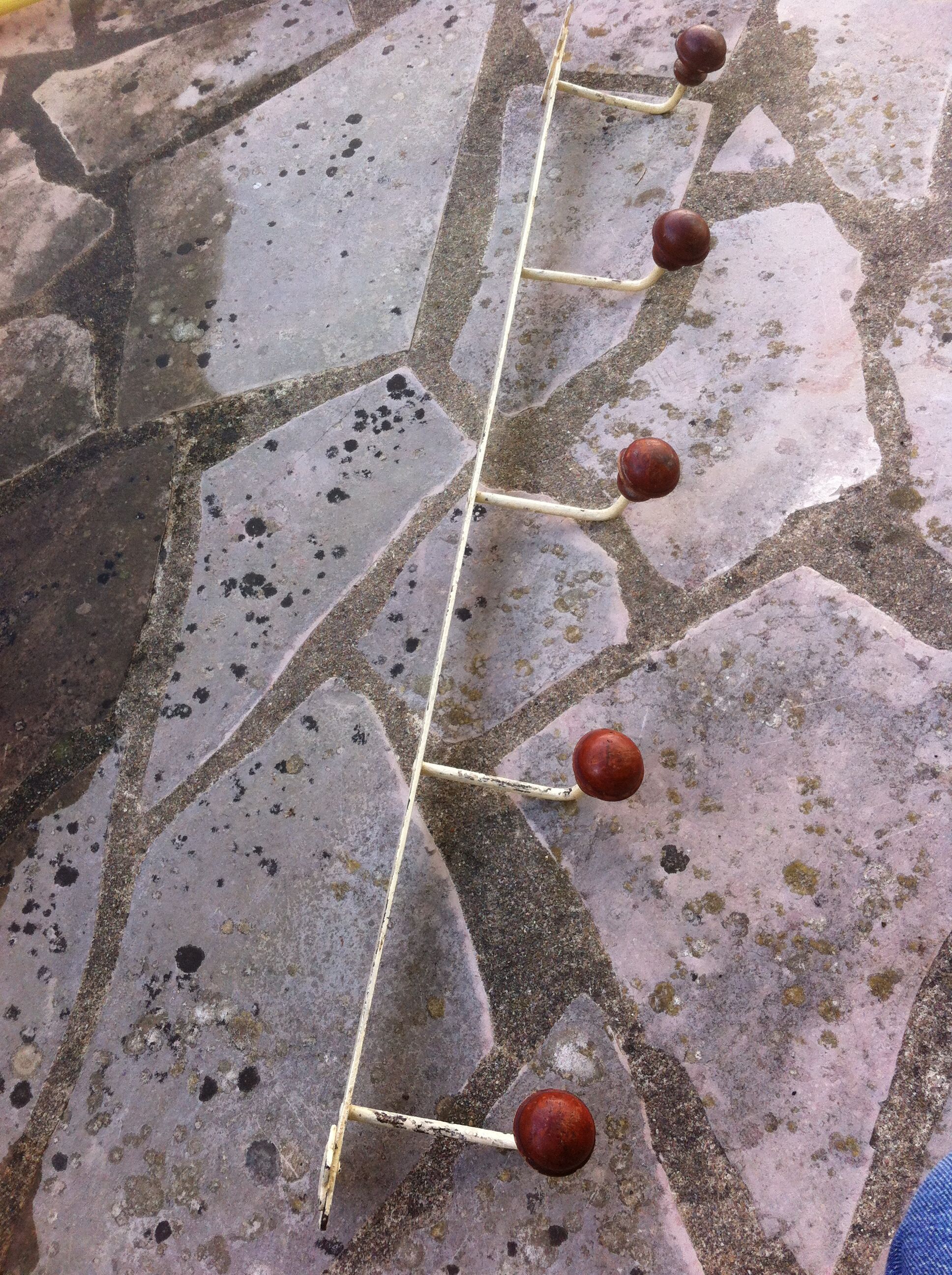 Vintage metal and wood coat rack
