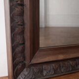 Antique carved wooden mirror