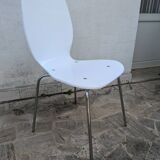 White plexiglass chair