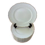 Suite of twelve table plates in white porcelain, golden lip