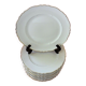 Suite of twelve table plates in white porcelain, golden lip