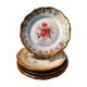 6 mismatched dessert plates decorated with roses