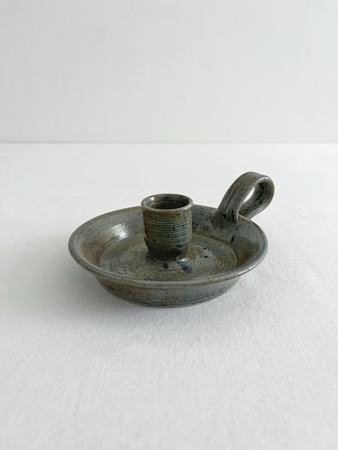 Vintage glazed stoneware hand candlestick
