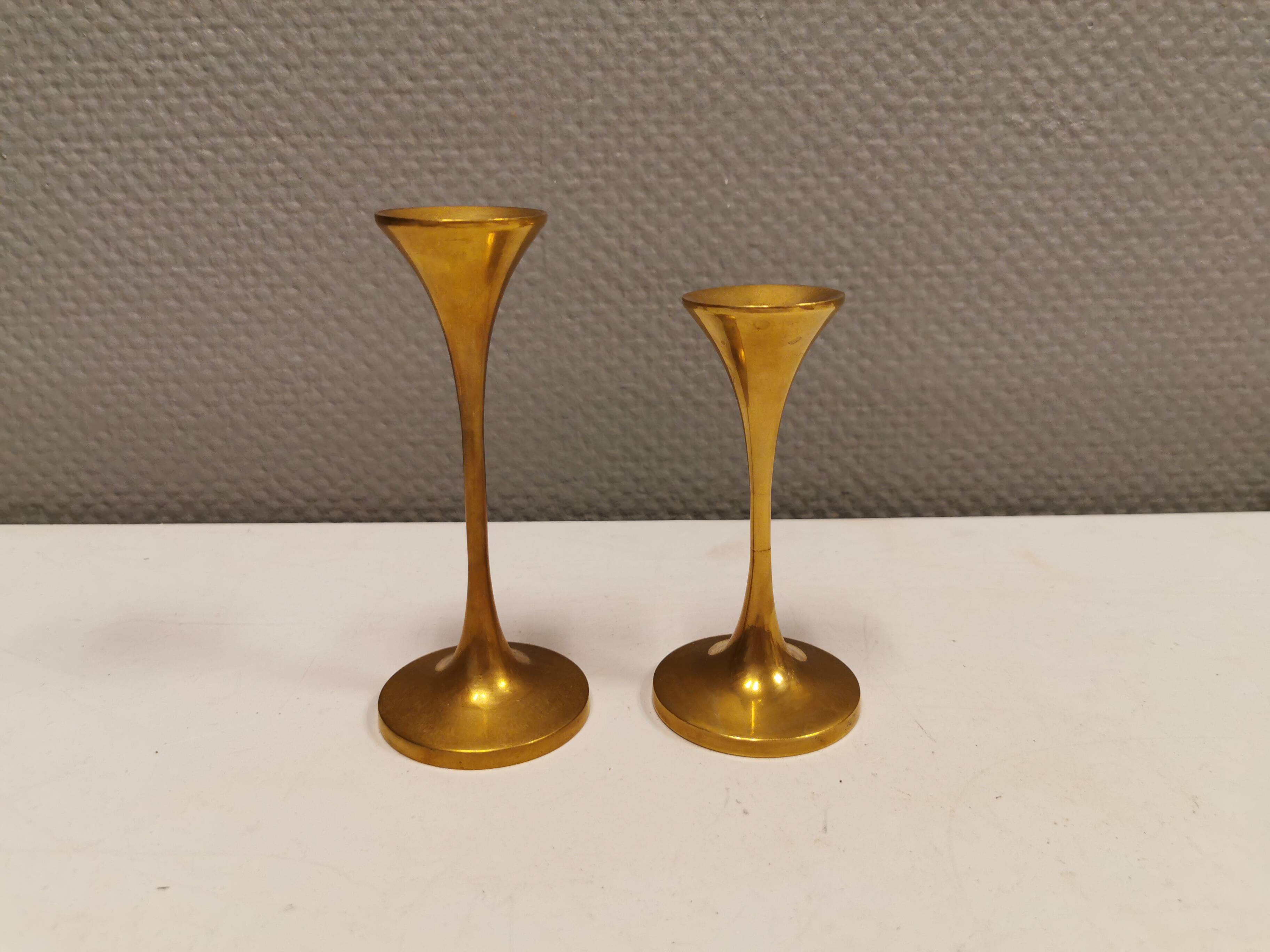 A set of candle sticks, in solid brass, made by Malm Denmark in the 1960s