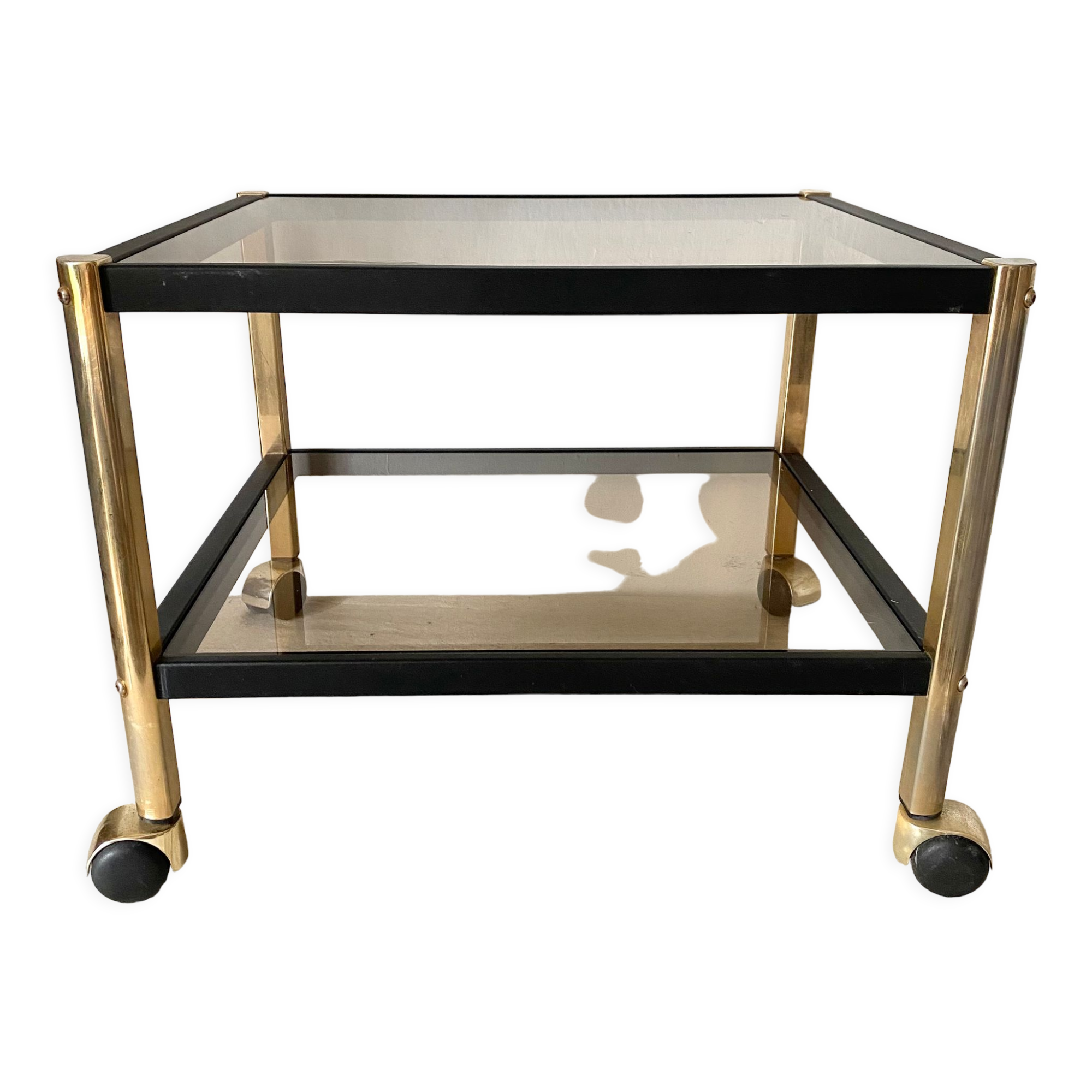 Serving with vintage wheels in metal and smoked glass