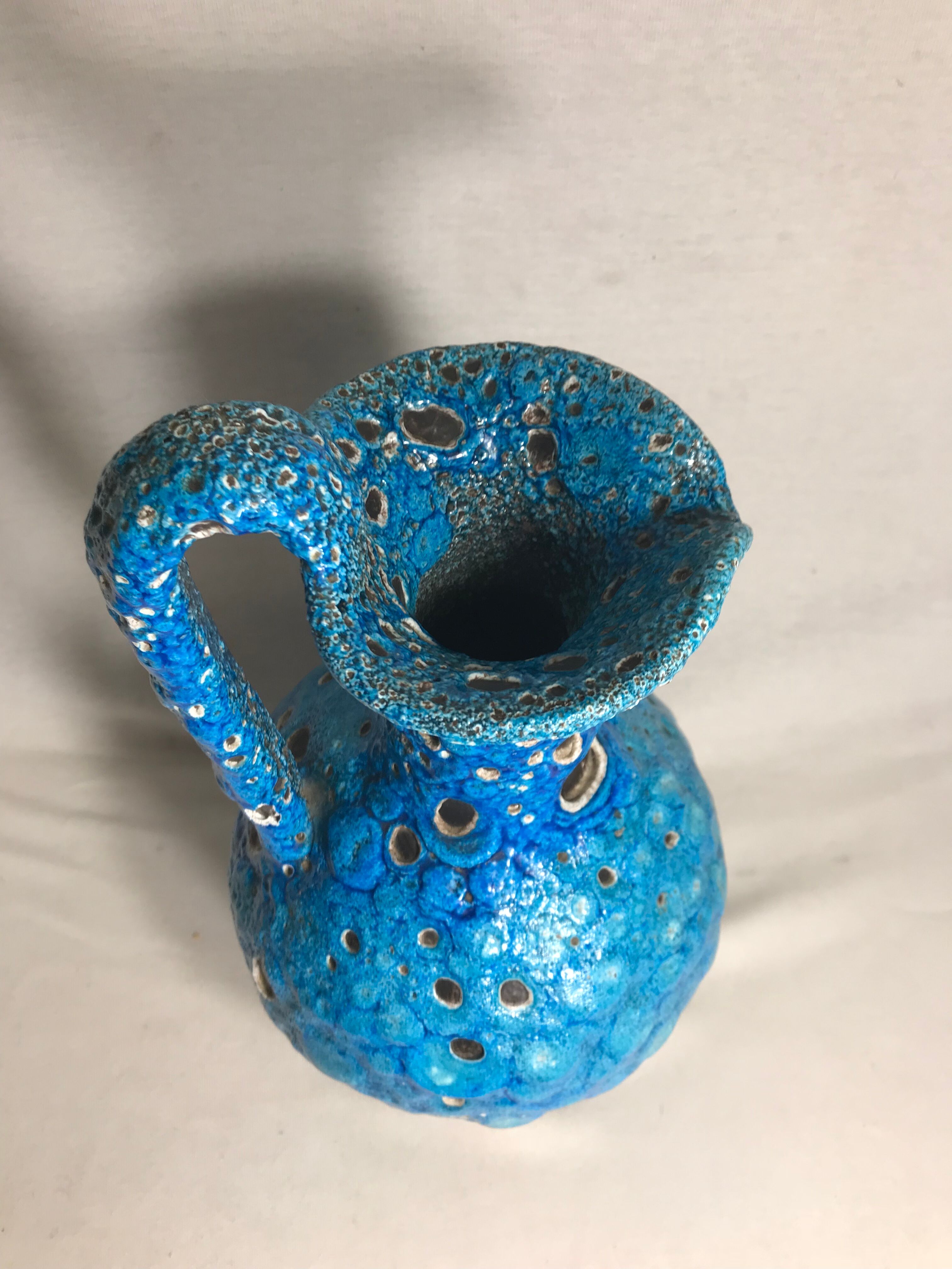 Former pitcher in blue ceramic