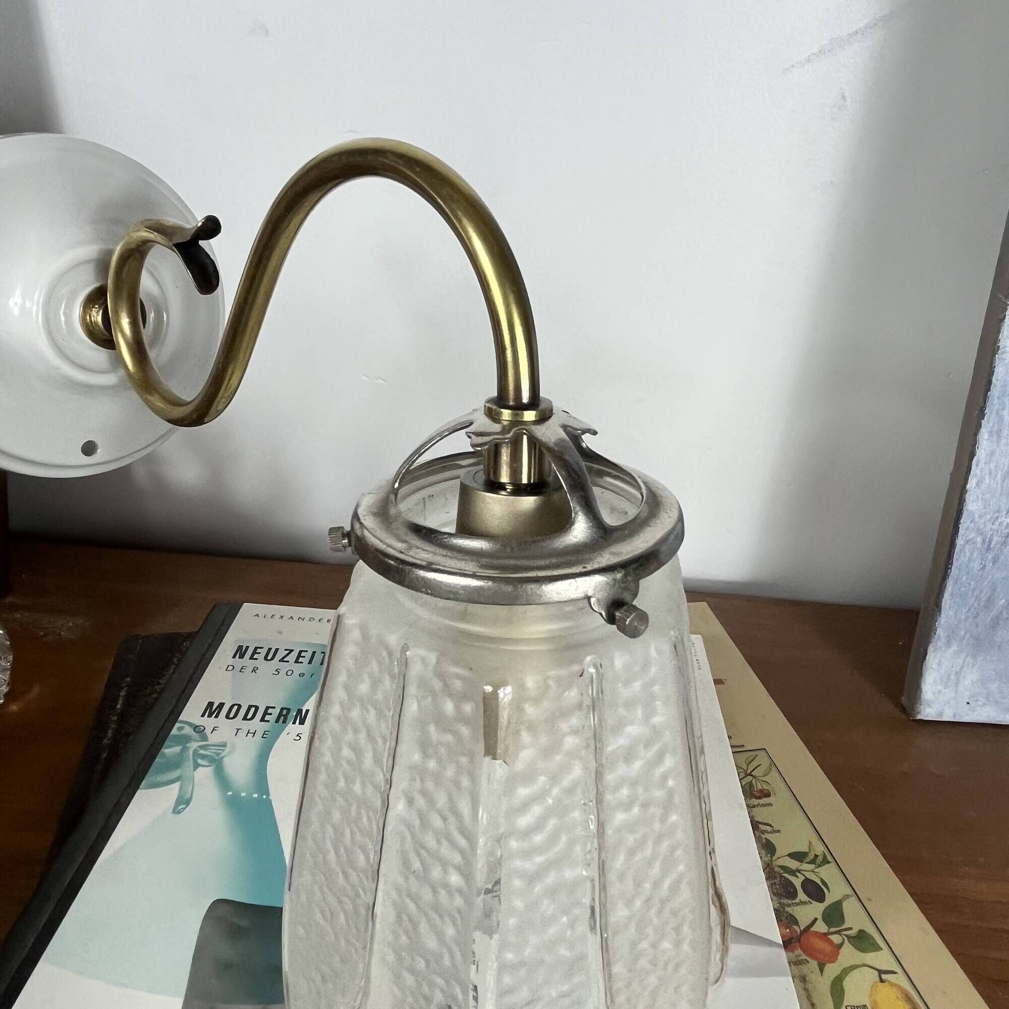 Vintage brass wall light with Art Nouveau tulip shade.