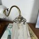 Vintage brass wall light with Art Nouveau tulip shade.