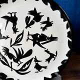 Large ceramic plate J. Lurçat with zoomorphic decoration in black on a white background.