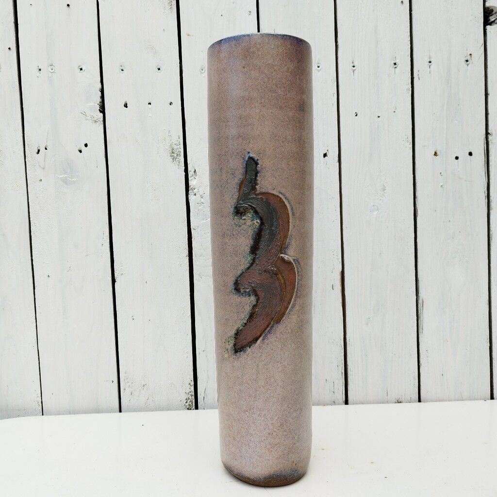 Enamelled ceramic roller vase signed