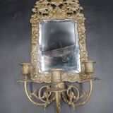 Repousse brass wall mirror with three candles, beveled glass, end of 19th century, double eagles