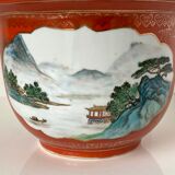 Chinese planter or Chinese porcelain pot cover decorated with landscapes on a coral and golden background
