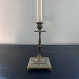 Chiseled brass candle holder