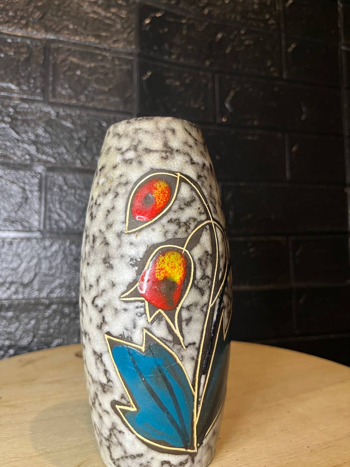 Ceramic vase with flower decor