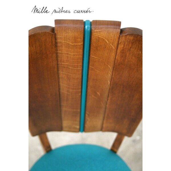 A set of 6 completely renovated turquoise chairs.